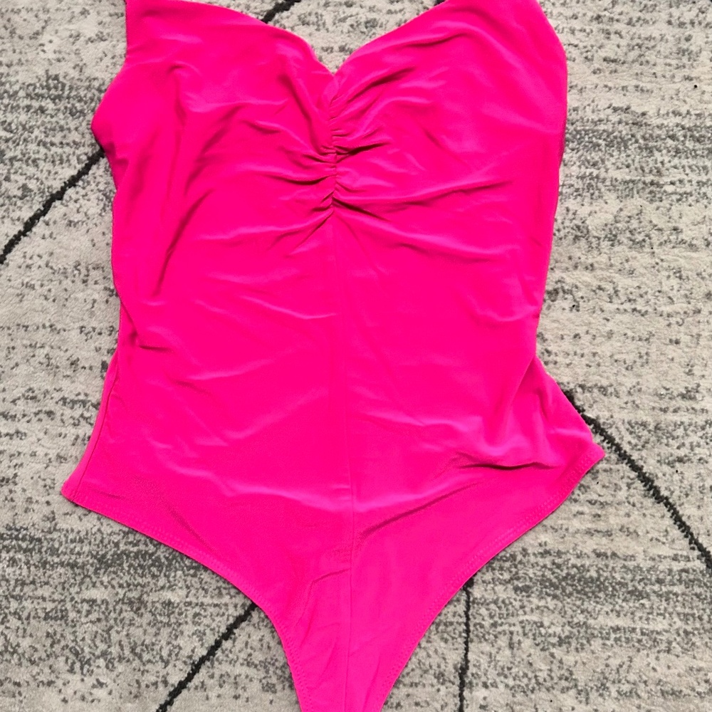 Pink body suit brand new